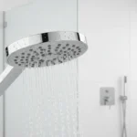 Optimize Water Usage: 7 Frugal Tips to Cut Your US Water Bill by 20% Low-flow showerhead demonstrating water efficiency